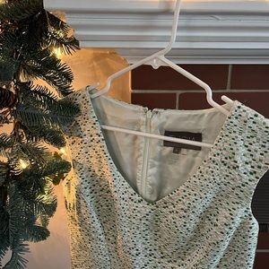 Perfect holiday dress!  Shades of green and gold and silver threads.